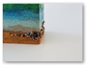 close up of small rectangular vase, sea bed